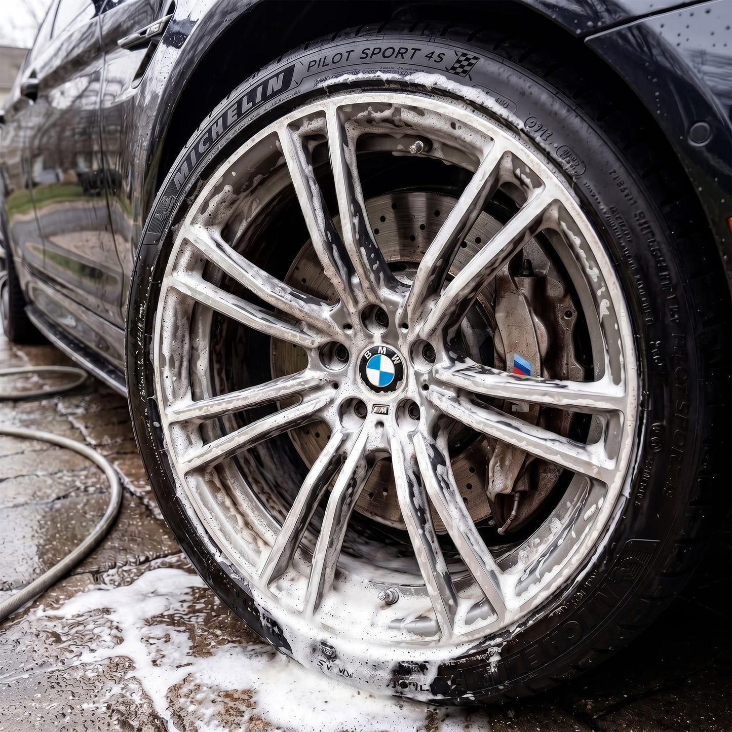 Brake Buster foam dwelling on alloy wheel before rinse